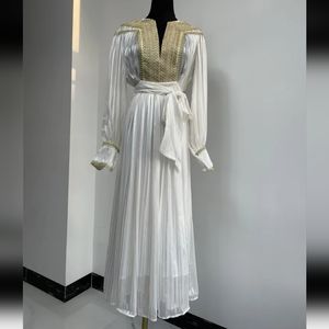 White and gold long sleeve maxi dress